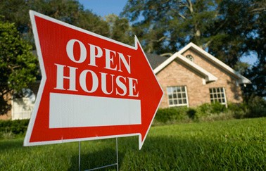 Open house sign points to home for sale