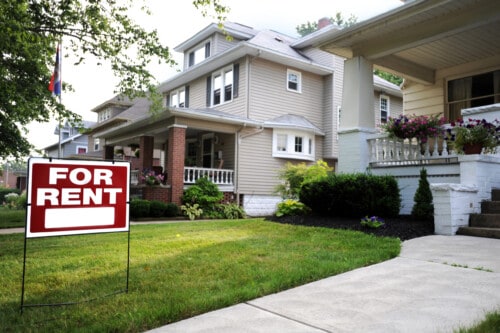 house with “for rent” sign - investor real estate agents