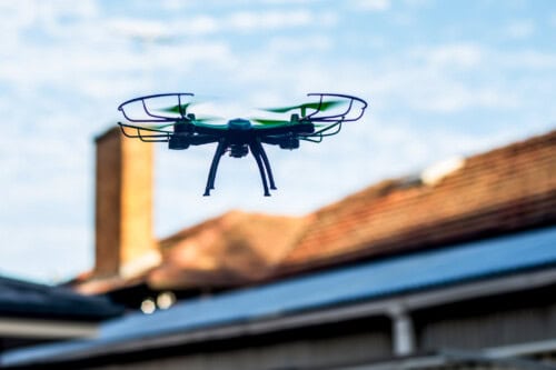 drone being used to take exterior images of home