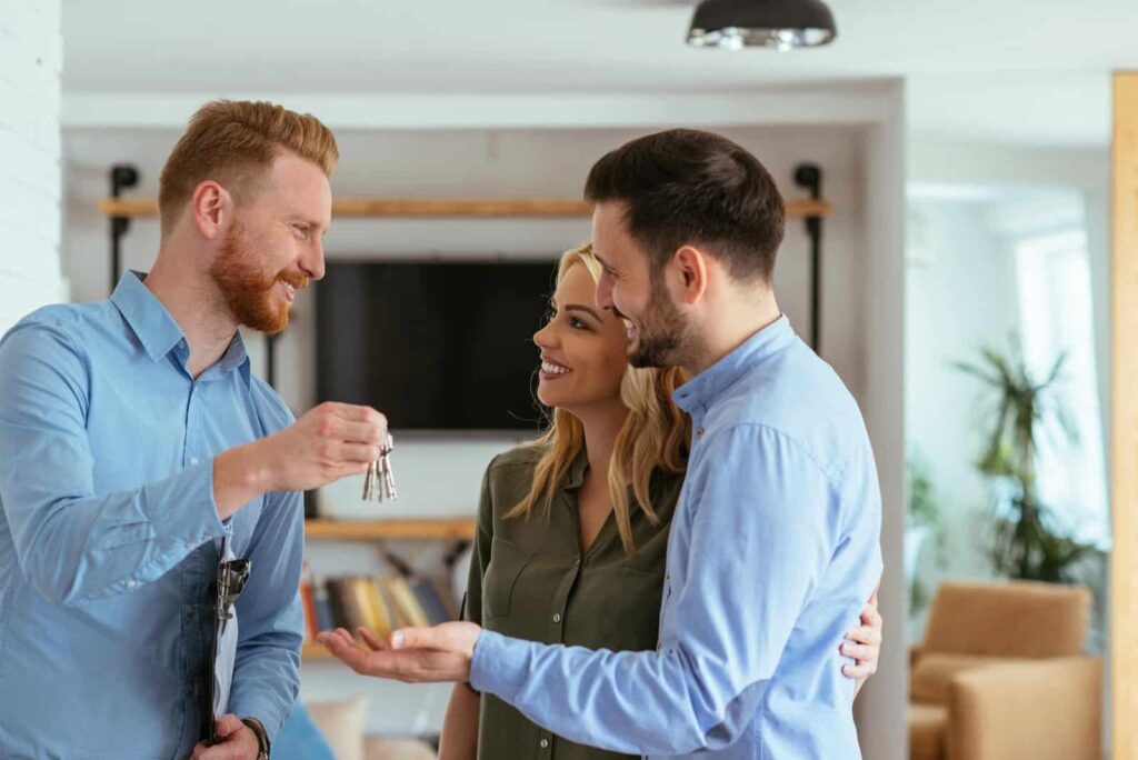 Missouri real estate agents showing a house to clients after getting their license